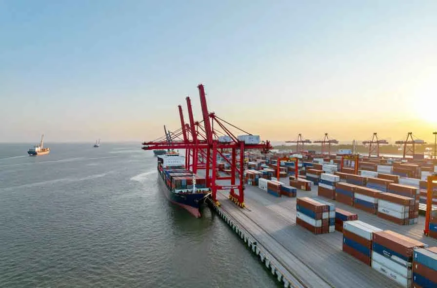 Container port scene representing DDP shipping for custom bathrobes, hotel robes, and wholesale textile orders.
