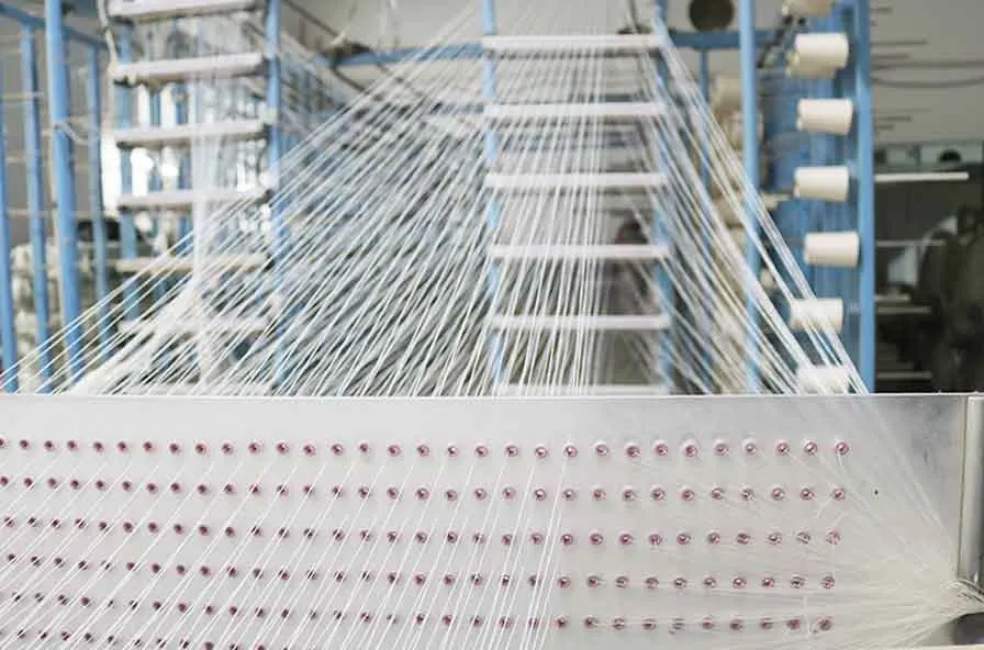 Softextiles yarn spinning process for bathrobe and soft textile manufacturing.